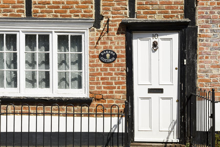 Winslow, UK - April 27, 2015. Traditional Georgian front door on a Tudor cottage in the historic market town of Winslow, Buckinghamshireのeditorial素材