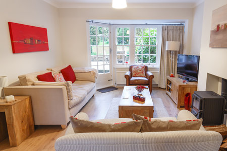 Living room in a contemporary style house with modern interior design and furnishingの写真素材