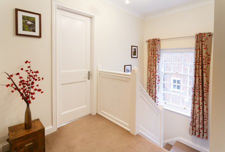 Upstairs landing hallway in a contemporary style house in Englandの写真素材