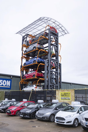 Aylesbury, UK - December 06, 2018. A rotary parking system is used on an industrial estate. The system provides an innovative way to increase parking capacity.