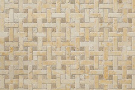 Mosaic floor tile, porcelain in a neutral coloured stone style