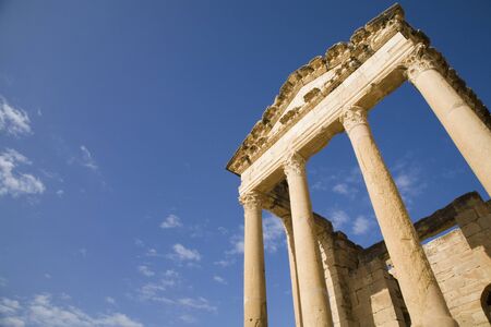 Temple of Minerva at the ancient roman ruins of Sufetula in Sbeitla, Tunisiaの写真素材