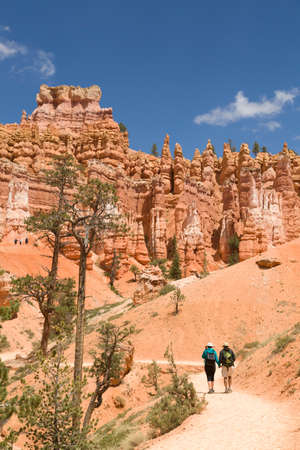BRYCE CANYON, UT - May 26, 2012. Caucasian couple hiking on a trail through Bryce Canyon National Park, Utah, USAのeditorial素材