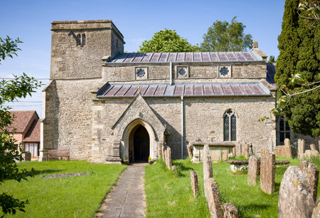 Exterior of old church with graveyard, St John the Baptist Church in Preston Bissett, Buckinghamshire, UKの写真素材