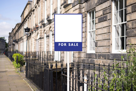 Blank house for sale sign template outside a Georgian town house in a UK urban streetの写真素材
