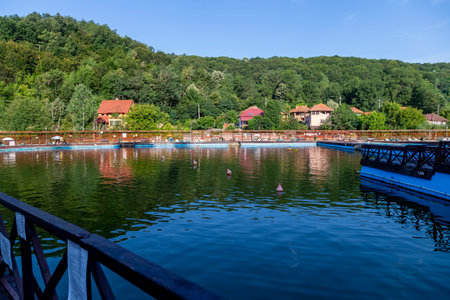 Baile Sacelu, Gorj County, Romania â July 24, 2022: View from inside the treatment base - the pools with therapeutic mud in Baile Sacelu resort, Gorj, Romaniaのeditorial素材