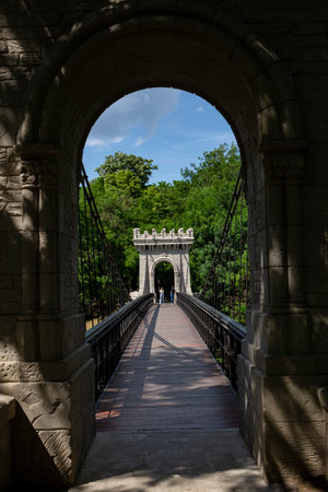 Craiova, Dolj, Romania â May 14, 2022: Suspended bridge in Romanescu Park, Craiovaのeditorial素材
