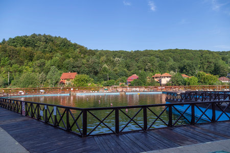 Baile Sacelu, Gorj County, Romania â July 24, 2022: View from inside the treatment base - the pools with therapeutic mud in Baile Sacelu resort, Gorj, Romaniaのeditorial素材