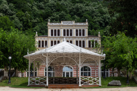 Baile Herculane ( Herculane Bath ), Romania - June 13, 2022:   Old casino and castle hotels  in the old area of the city Baile Herculane, Caras-Severin, Romania. Construction detaiのeditorial素材