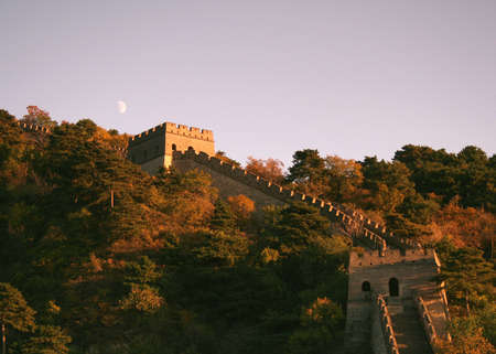 The Moon rising over the Great Wall of China