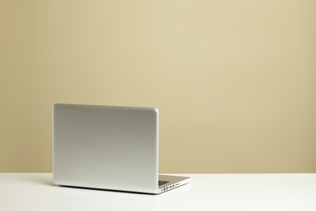 Open Laptop on white deskの写真素材
