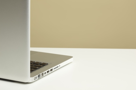 Open Laptop on white deskの写真素材