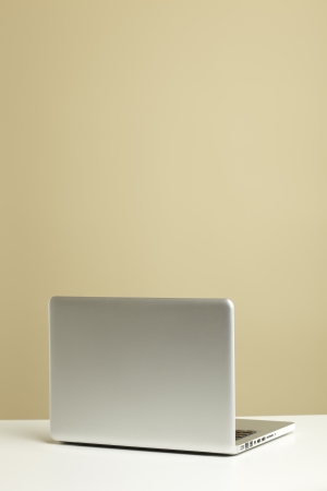 Open Laptop on white deskの写真素材