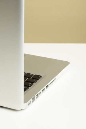 Open Laptop on white deskの写真素材