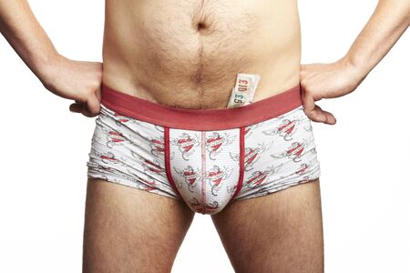 Male stripper with with money tucked into underwearの写真素材