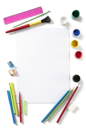 Back to School pupils art pad paints pencils and pens on white school desk from aboveの写真素材