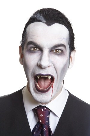 Man in dracula fancy dress costume on white backgroundの写真素材