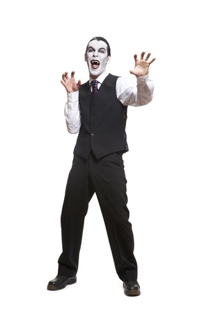 Man in dracula fancy dress costume on white backgroundの写真素材