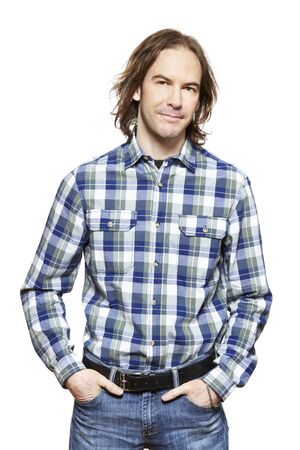 Casually dressed man smiling on white backgroundの写真素材