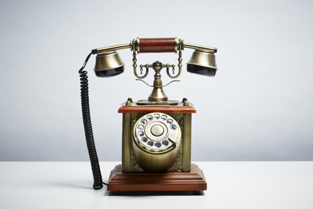 Antique telephone isolated on white background  Communication conceptの写真素材