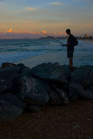 Fisherman on Seaway  at Dusk ,Tallabudgera National Park, QLD, Australiaの写真素材
