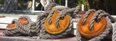 a set of old ship pully wheels & riggingの写真素材