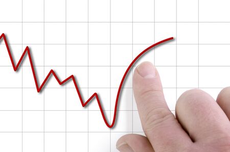 falling stock price is being pushed upwards by fingerの写真素材