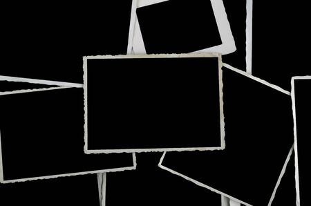 old phot frames stapeld, superposingly and empty, black interiorの写真素材