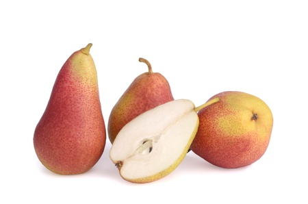 Three pears and a half on white background show fruit pulp, isolatedの写真素材