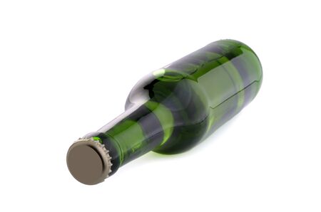 Green bottle with liquid and crown cap, isolated on white backgroundの写真素材