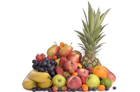 Different kinds of fruits arranged as pyramid , white backgroundの写真素材