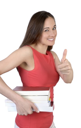 Pretty female student smiling with books, Studio Shotの写真素材