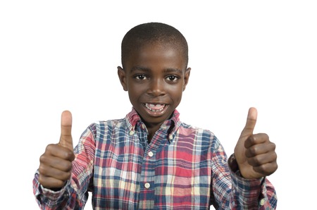 African boy showing thumb up, Studio Shotの写真素材