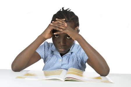 African girl having stress while learning, Studio Shotの写真素材