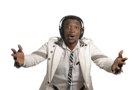 African artist having fun with head phones, Studio Shotの写真素材