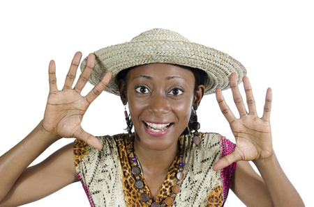 Beautiful African Woman Showing Hands and Smiling, Studio Shot, Cameroonの写真素材