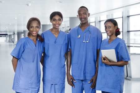 African physician team with tablet PC, Studio Shotの写真素材