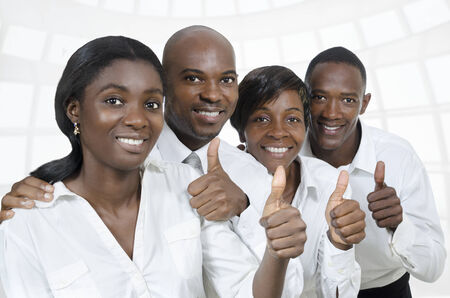 African business team    students thumbs up, Studio Shotの写真素材