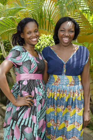 Two Happy African women Chatting Outdoor, Outdoor Shot Cameroonの写真素材