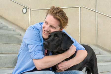 Happy young man with his dog, Outdoor