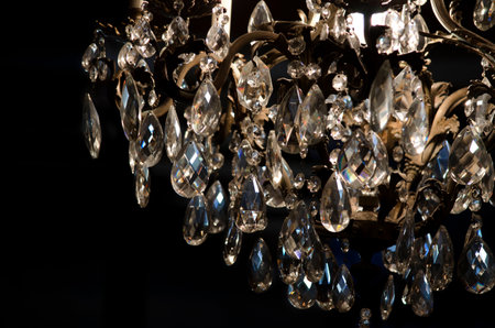 Chandelier before dark background, indoor shotの写真素材