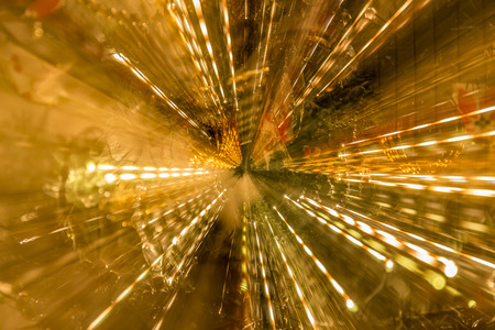 Christmas tree motion blur colorful lights bokeh zoomの写真素材