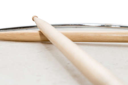 Wood snare drum and drumsticks isolated in white backgroundの写真素材