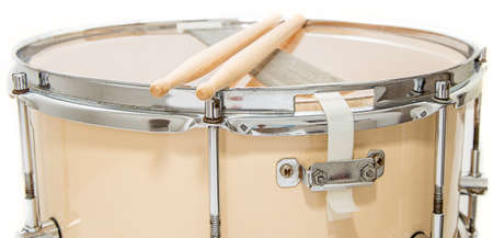 Wood snare drum and drumsticks isolated in white backgroundの写真素材