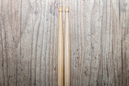 Wood Drumsticks isolate in wood backgroundの写真素材