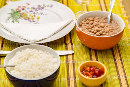 Baked beans on the table with texture. This brazilian beans it's known as Carioquinha.の写真素材