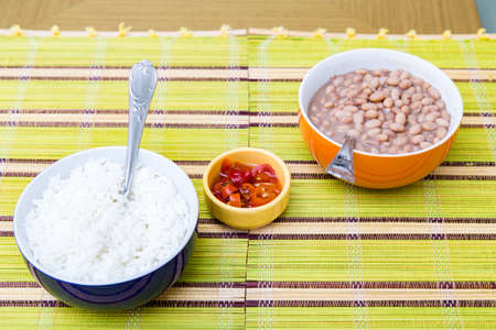 Baked beans on the table with texture. This brazilian beans it's known as Carioquinha.の写真素材