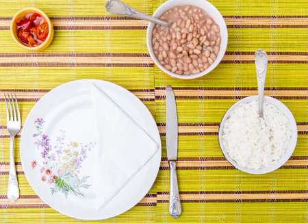Baked beans on the table with texture. This brazilian beans it's known as Carioquinha.の写真素材
