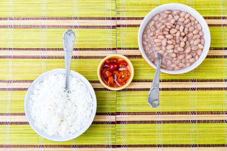 Baked beans on the table with texture. This brazilian beans it's known as Carioquinha.の写真素材