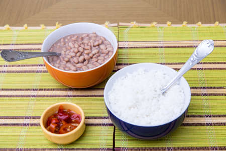 Baked beans on the table with texture. This brazilian beans it's known as Carioquinha.の写真素材